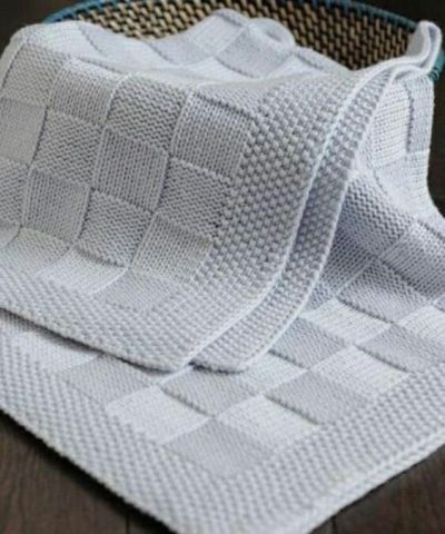 Мягкое вязаное одеяло плетеным узором 27
